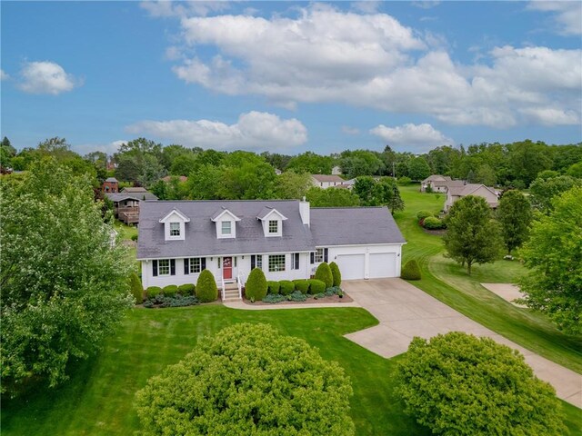 113 Sunburst Ct, Center Twp But, PA 16001 - cape cod house featuring an attached garage, concrete driveway, a front lawn, and view of wooded area