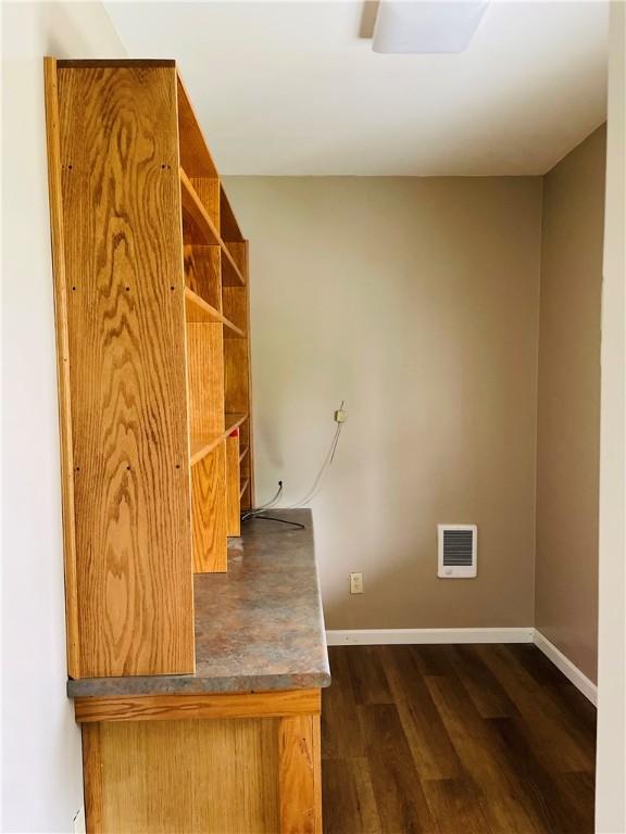 192 W Lincoln St, Waynsbrg/Frankln Twp, PA 15370 - unfurnished office with dark wood-style floors and baseboards