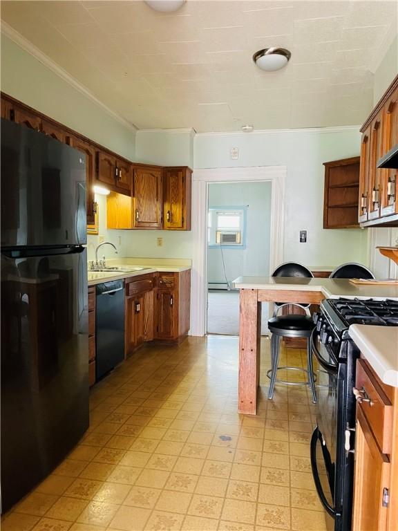 192 W Lincoln St, Waynsbrg/Frankln Twp, PA 15370 - kitchen with black appliances, light countertops, a sink, ornamental molding, and brown cabinets
