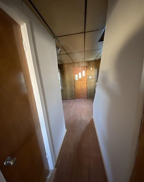 314 Lowell Unit 1/2, Vandergrift Wml, PA 15690 - corridor with wood finished floors, a drop ceiling, and wood walls