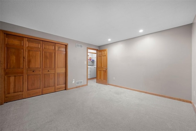 100 Firethorn Rd, Economy, PA 15005 - unfurnished bedroom featuring washer / clothes dryer, light colored carpet, baseboards, recessed lighting, and a closet