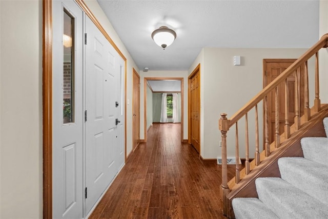 100 Firethorn Rd, Economy, PA 15005 - corridor with dark wood-type flooring, stairs, and baseboards