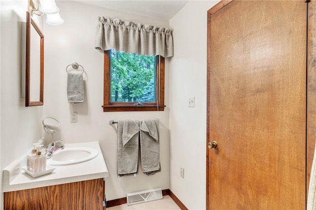 454 Cherokee Dr, Center Twp But, PA 16001 - bathroom featuring vanity and baseboards