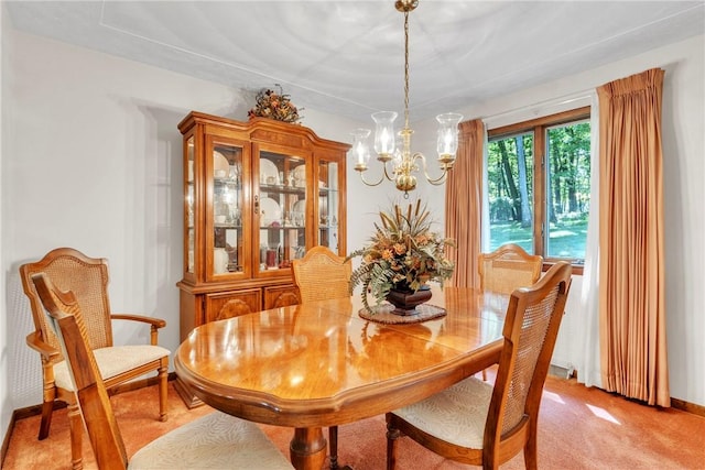454 Cherokee Dr, Center Twp But, PA 16001 - dining space with a chandelier, light carpet, and baseboards