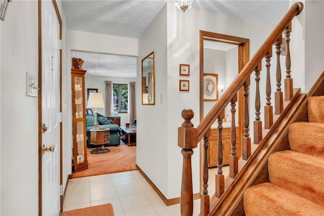 454 Cherokee Dr, Center Twp But, PA 16001 - entryway with light carpet, stairway, baseboards, and light tile patterned floors