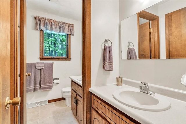 454 Cherokee Dr, Center Twp But, PA 16001 - bathroom with vanity, toilet, and tile patterned floors
