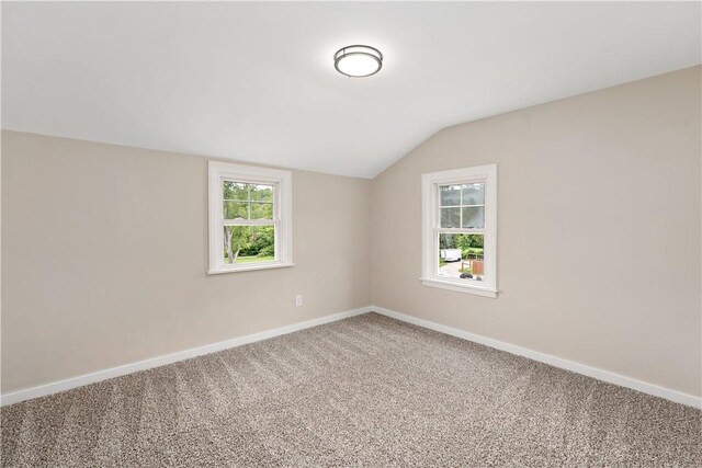 6225 Smithfield St, Elizabeth Twp/Boro, PA 15135 - carpeted empty room featuring vaulted ceiling and baseboards