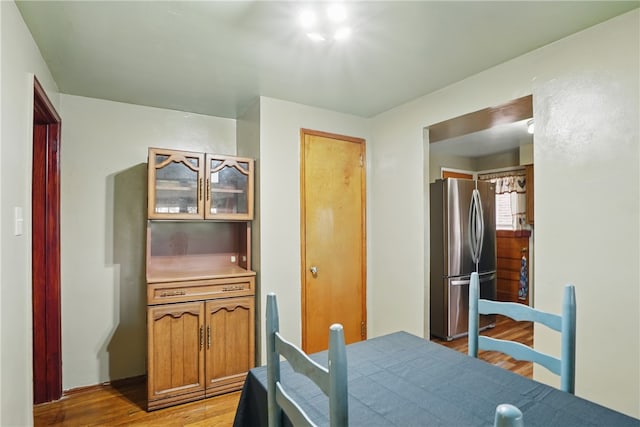1406 Mccully Rd, Castle Shannon, PA 15234 - bedroom with freestanding refrigerator and light wood finished floors
