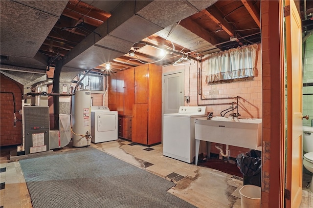 1406 Mccully Rd, Castle Shannon, PA 15234 - unfinished below grade area with water heater, washing machine and clothes dryer, a sink, and heating unit