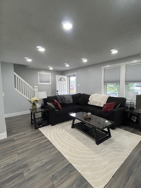 42 Queenston St, Overbrook, PA 15210 - living area with wood finished floors, stairs, recessed lighting, and baseboards