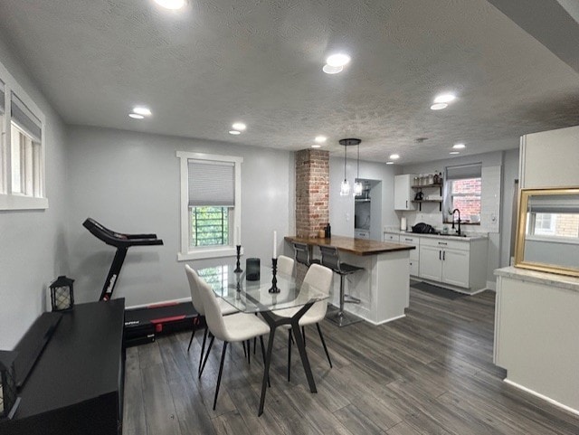 42 Queenston St, Overbrook, PA 15210 - dining area featuring dark wood-style flooring, recessed lighting, a textured ceiling, and baseboards
