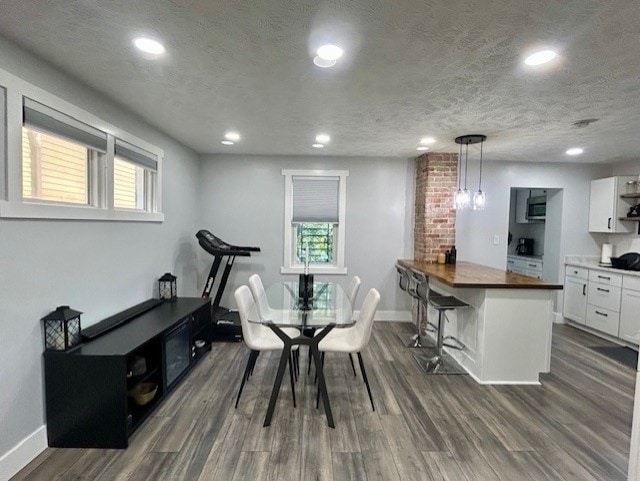 42 Queenston St, Overbrook, PA 15210 - dining room featuring dark wood-type flooring, baseboards, plenty of natural light, recessed lighting, and a textured ceiling