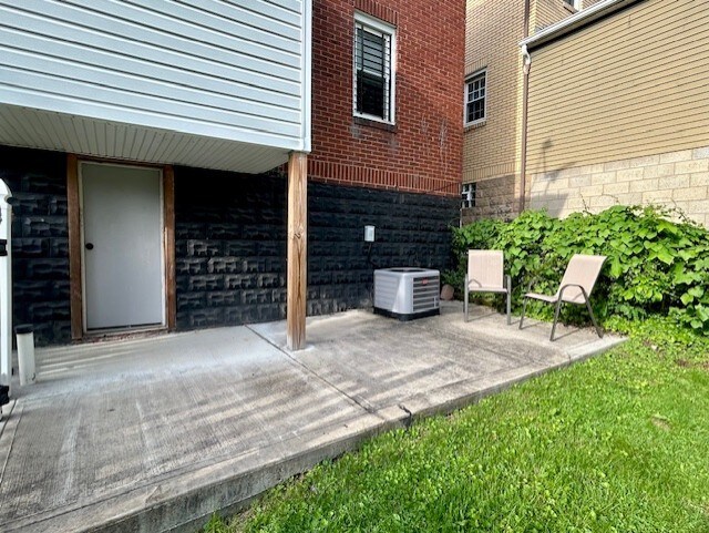 42 Queenston St, Overbrook, PA 15210 - view of patio with central AC unit