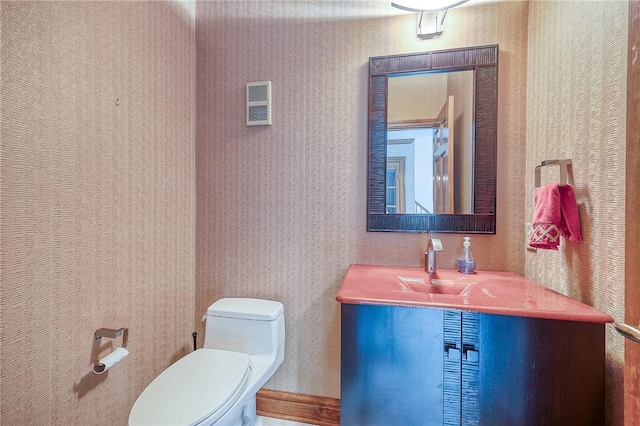 23 Pintail Dr, Indiana Twp Nal, PA 15238 - bathroom featuring vanity, toilet, and wallpapered walls