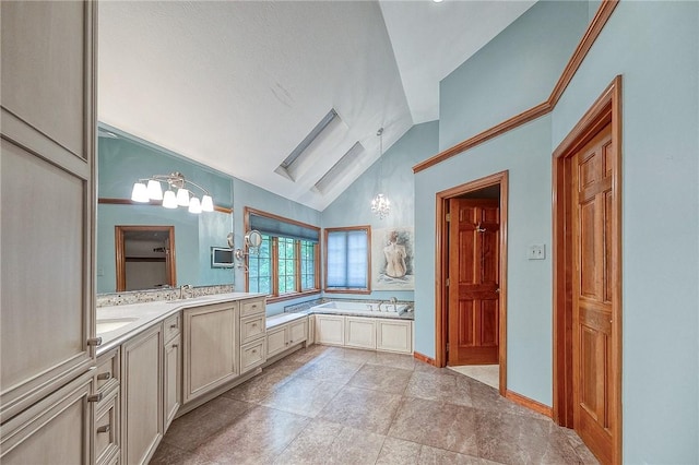 23 Pintail Dr, Indiana Twp Nal, PA 15238 - bathroom with lofted ceiling, vanity, a garden tub, and a chandelier