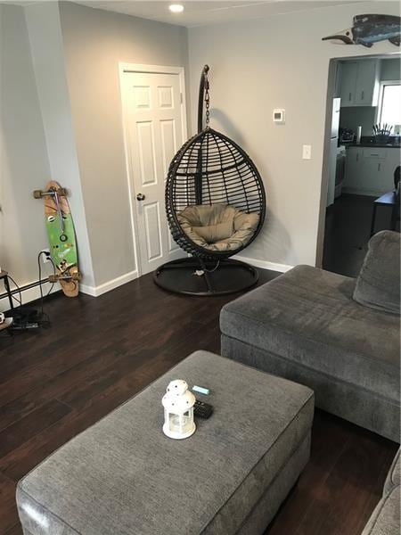 1322 Lowrie St, Troy Hill, PA 15212 - living room with wood finished floors, baseboards, and recessed lighting