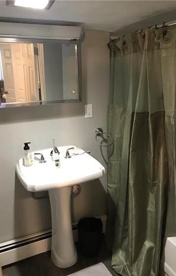 1322 Lowrie St, Troy Hill, PA 15212 - full bath with a shower with shower curtain and a baseboard radiator