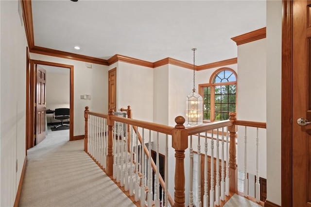 15 Rosemont Ln, Squirrel Hill, PA 15217 - hallway featuring an upstairs landing, ornamental molding, light colored carpet, and baseboards