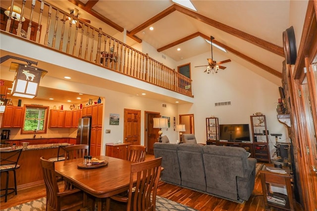 1147 Annisville Rd, Washington Twp But, PA 16050 - dining room featuring beam ceiling, ceiling fan, hardwood / wood-style floors, and high vaulted ceiling