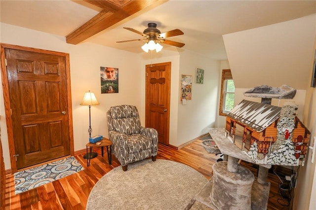 1147 Annisville Rd, Washington Twp But, PA 16050 - living room featuring wood finished floors, ceiling fan, beamed ceiling, and baseboards