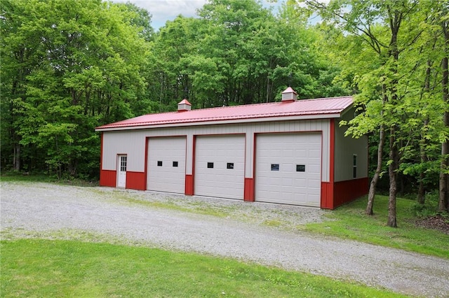1147 Annisville Rd, Washington Twp But, PA 16050 - detached garage featuring a forest view