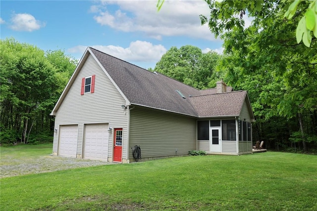 1147 Annisville Rd, Washington Twp But, PA 16050 - view of home's exterior with a sunroom, a chimney, roof with shingles, and a yard