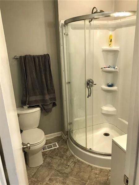 1124 Brabec St, Troy Hill, PA 15212 - full bathroom with a stall shower, toilet, and baseboards