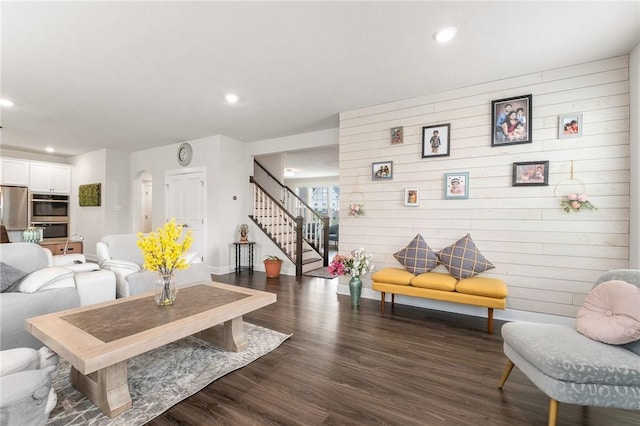 712 Mulkerrin Ct, Pine Twp Nal, PA 16046 - living area featuring stairs, dark wood-style floors, recessed lighting, and arched walkways