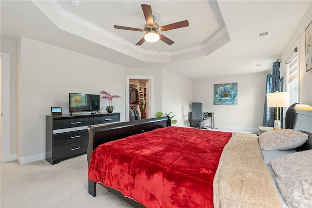 712 Mulkerrin Ct, Pine Twp Nal, PA 16046 - bedroom with a raised ceiling, light colored carpet, ornamental molding, a walk in closet, and baseboards