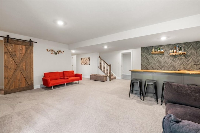 712 Mulkerrin Ct, Pine Twp Nal, PA 16046 - living area featuring a dry bar, a barn door, carpet, stairway, and recessed lighting