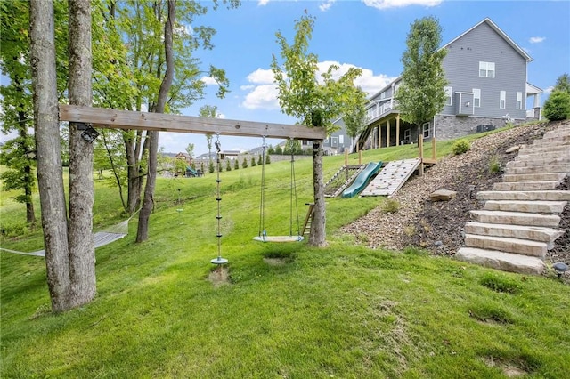 712 Mulkerrin Ct, Pine Twp Nal, PA 16046 - view of green lawn with stairway and a wooden deck