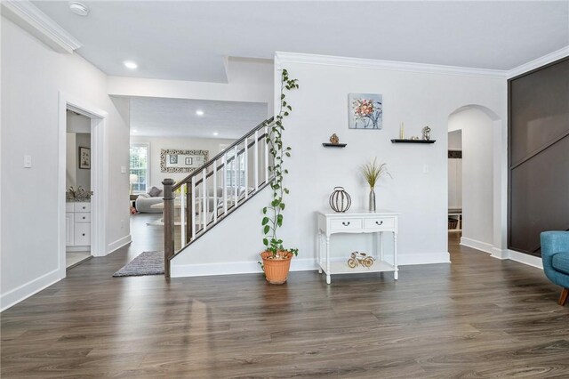 712 Mulkerrin Ct, Pine Twp Nal, PA 16046 - foyer featuring arched walkways, stairs, wood finished floors, baseboards, and crown molding