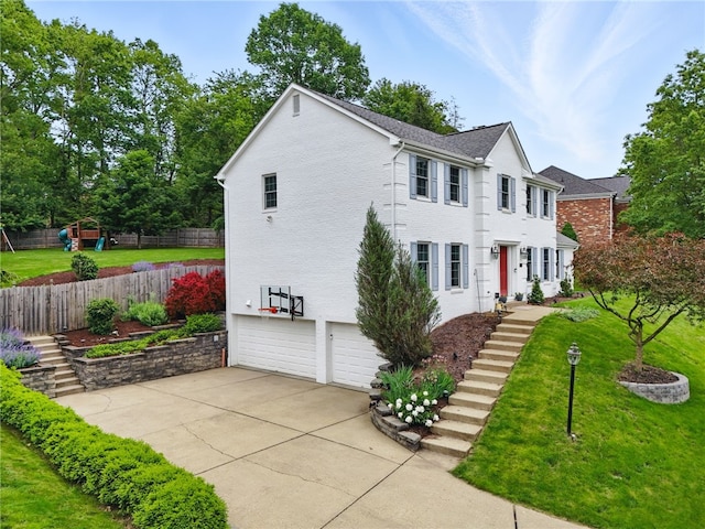 2455 Wedgewood Dr, Franklin Park, PA 15090 - colonial inspired home featuring a garage, driveway, a playground, and stairway