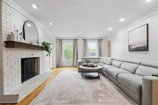 2455 Wedgewood Dr, Franklin Park, PA 15090 - living room with crown molding, wood finished floors, a brick fireplace, and recessed lighting