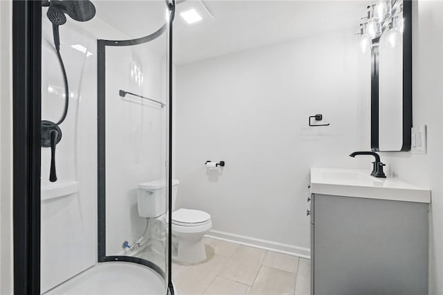 2455 Wedgewood Dr, Franklin Park, PA 15090 - bathroom featuring toilet, vanity, a shower stall, baseboards, and tile patterned flooring