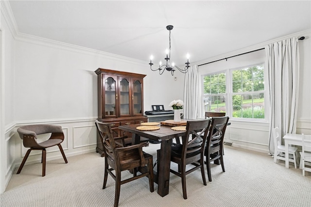 2455 Wedgewood Dr, Franklin Park, PA 15090 - dining area with a chandelier, light colored carpet, ornamental molding, a decorative wall, and a wainscoted wall