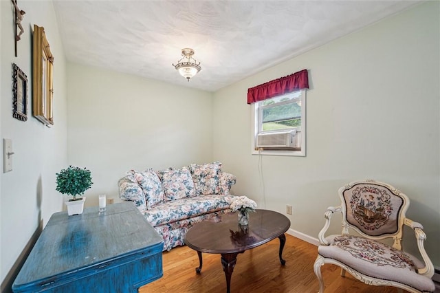 73 Hartman Rd, Green/Commdre/Prchse, PA 15759 - living area featuring wood finished floors, baseboards, and cooling unit