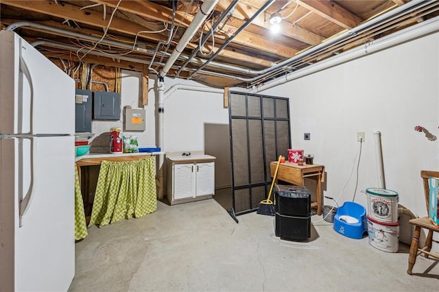 73 Hartman Rd, Green/Commdre/Prchse, PA 15759 - unfinished basement featuring freestanding refrigerator and electric panel