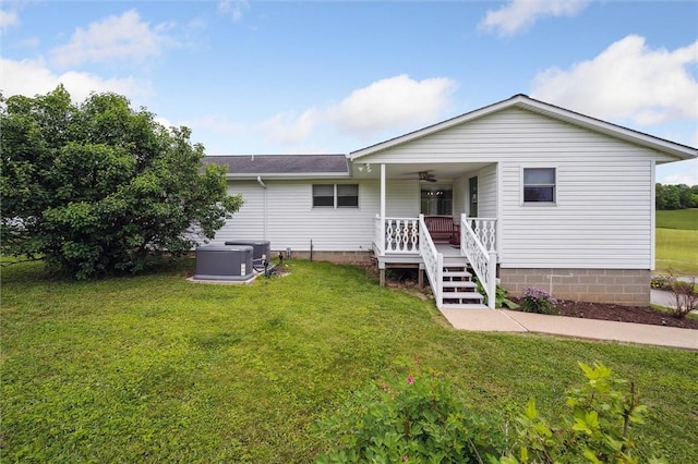 73 Hartman Rd, Green/Commdre/Prchse, PA 15759 - back of property featuring a lawn, central air condition unit, and covered porch
