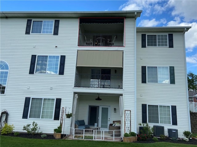 350 Hidden Ridge Ct Unit 302, South Park, PA 15129 - rear view of house featuring a balcony, central AC unit, and a patio