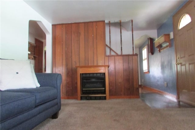 12840 Lincoln Way N, Huntingdon, PA 15642 - carpeted living room featuring healthy amount of natural light and wood walls
