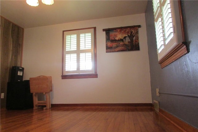12840 Lincoln Way N, Huntingdon, PA 15642 - empty room with wood finished floors, plenty of natural light, and baseboards