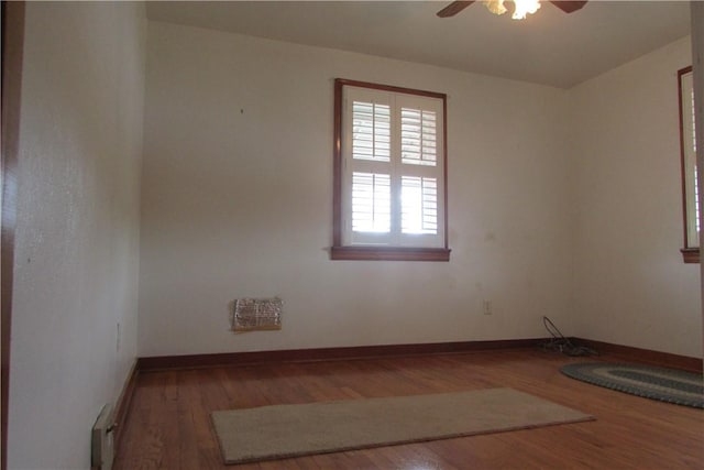 12840 Lincoln Way N, Huntingdon, PA 15642 - spare room featuring wood finished floors, a ceiling fan, baseboards, and baseboard heating