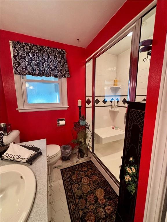 11 Worthington Ave, Neshannock Twp, PA 16105 - full bathroom with toilet, a shower stall, vanity, and tile patterned flooring