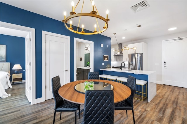 3725 Butler St Unit 406, Lawrenceville, PA 15201 - dining room featuring a chandelier, dark wood-type flooring, baseboards, and recessed lighting