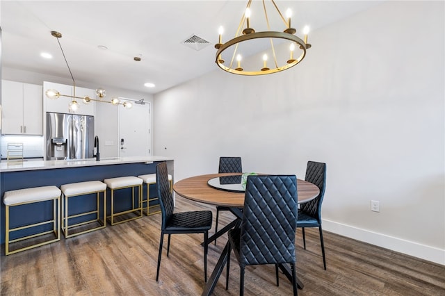 3725 Butler St Unit 406, Lawrenceville, PA 15201 - dining space featuring a chandelier, dark wood-style flooring, baseboards, and recessed lighting