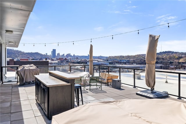 3725 Butler St Unit 406, Lawrenceville, PA 15201 - view of patio / terrace with a grill and a view of city