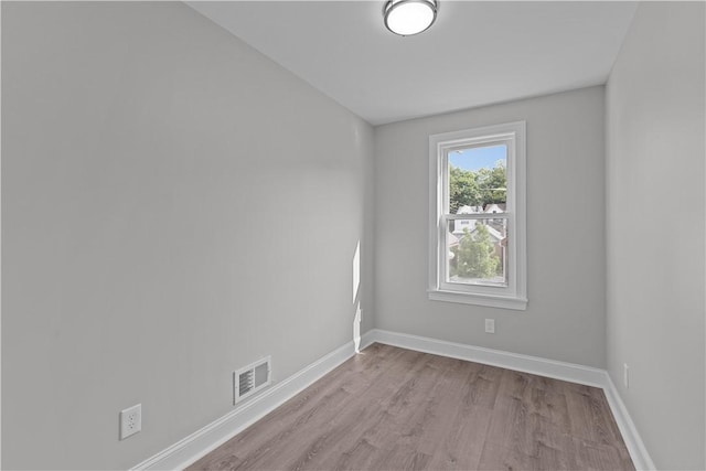 748 Anaheim St, Schenley Heights, PA 15219 - spare room with wood finished floors and baseboards