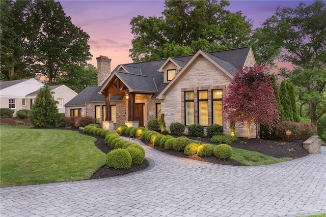 2293 Country Club Dr, Upper St Clair, PA 15241 - craftsman-style house featuring stone siding, a chimney, and a front lawn