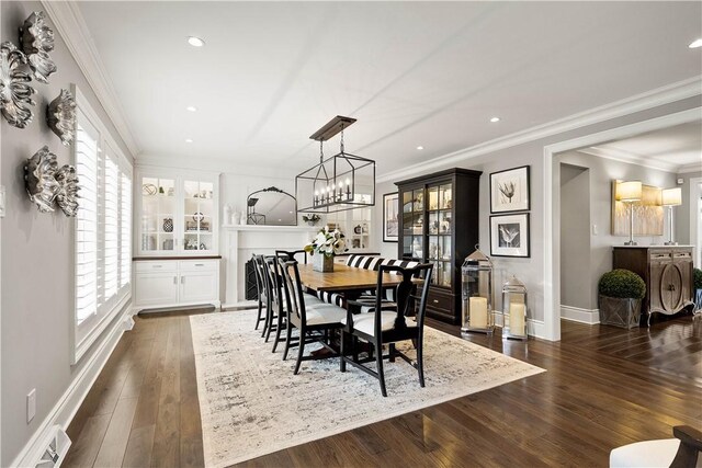 2293 Country Club Dr, Upper St Clair, PA 15241 - dining room with dark wood-type flooring, crown molding, baseboards, recessed lighting, and a chandelier